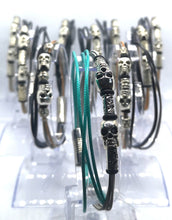 Load image into Gallery viewer, Twin Skull Guitar String Bracelet
